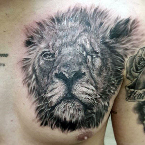 tatuaje leon realista para hombre 12