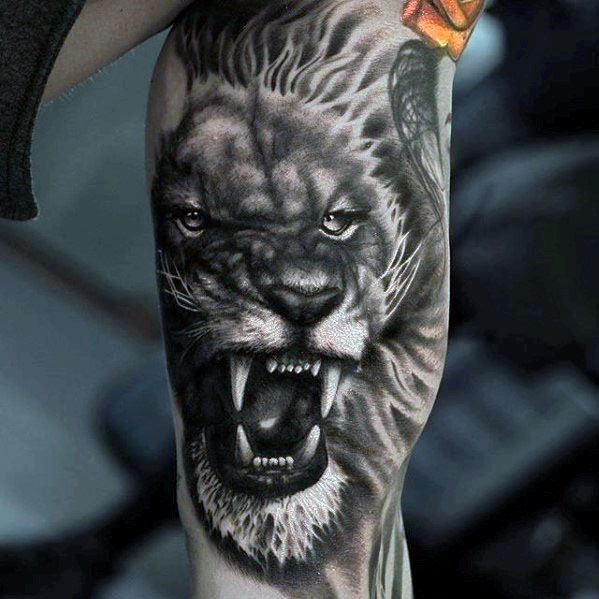 tatuaje leon realista para hombre 16