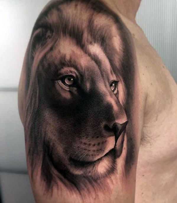 tatuaje leon realista para hombre 34