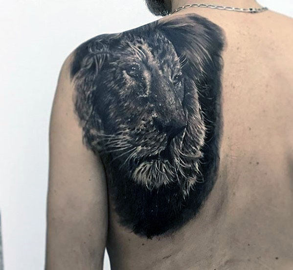 tatuaje leon realista para hombre 36