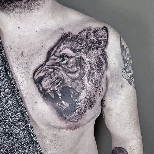 tatuaje leon realista para hombre 42