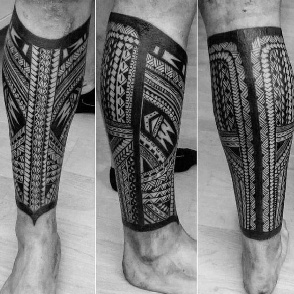 tatuaje polinesio pierna para hombre 34
