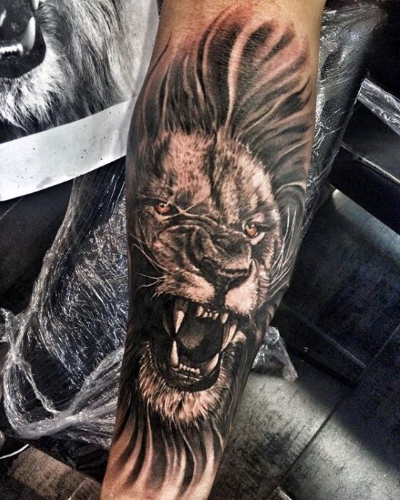 tatuaje leon antebrazo para hombre 16