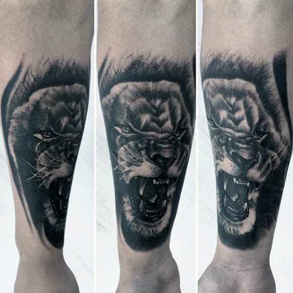 tatuaje leon antebrazo para hombre 17