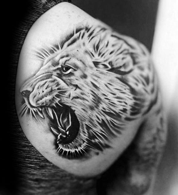 tatuaje leon hombro para hombre 14