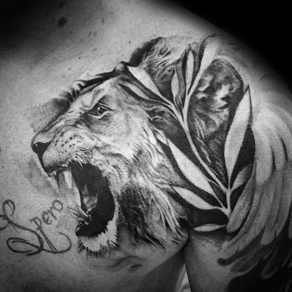 tatuaje leon hombro para hombre 26