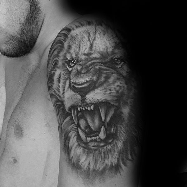 tatuaje leon hombro para hombre 41
