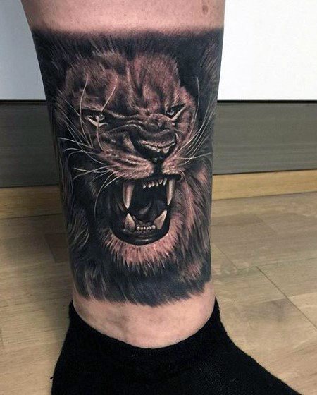 tatuaje leon pierna para hombre 08
