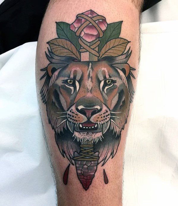 tatuaje leon pierna para hombre 15