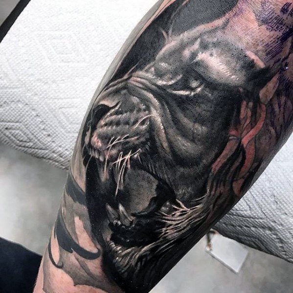 tatuaje leon pierna para hombre 16