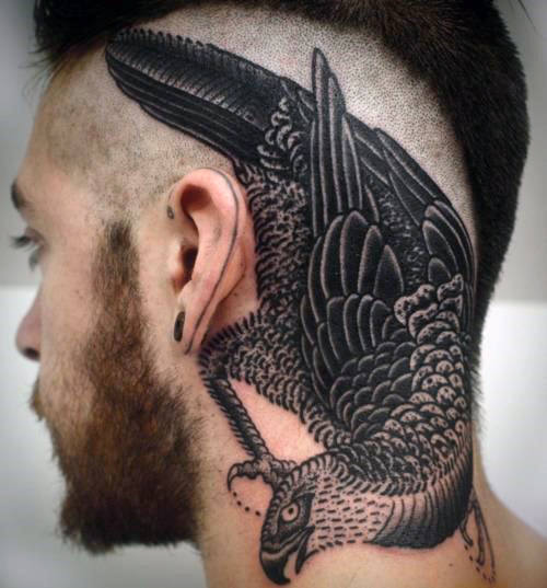 tatuaje pajaro para hombre 41