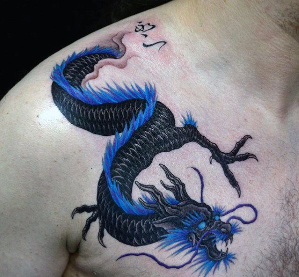 pequeno tatuaje dragon para hombre 21