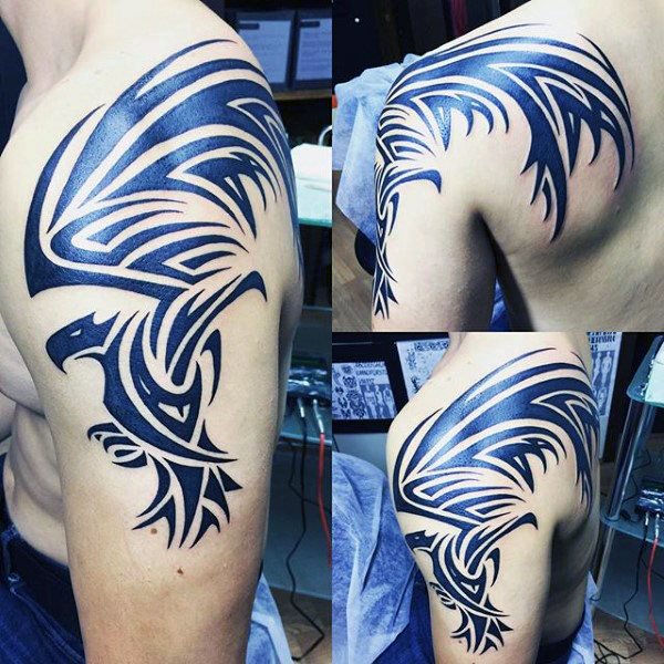tatuaje aguila tribal para hombre 14