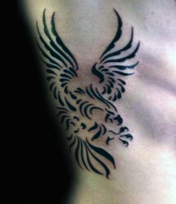 tatuaje aguila tribal para hombre 22