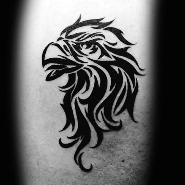 tatuaje aguila tribal para hombre 26