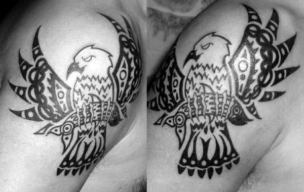 tatuaje aguila tribal para hombre 31