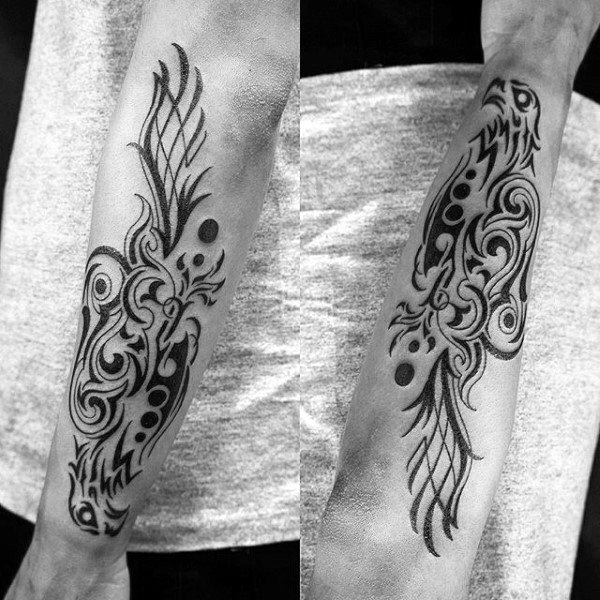 tatuaje aguila tribal para hombre 36