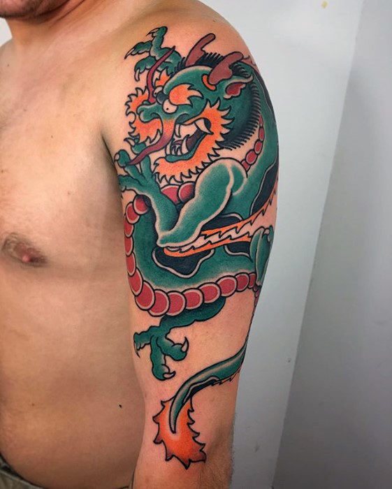 tatuaje clasico dragon para hombre 16