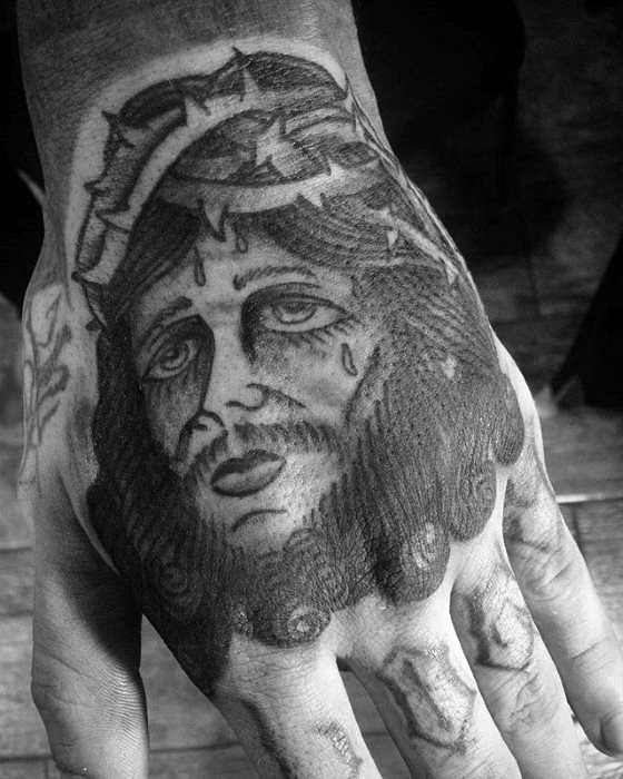 tatuaje clasico jesus para hombre 44