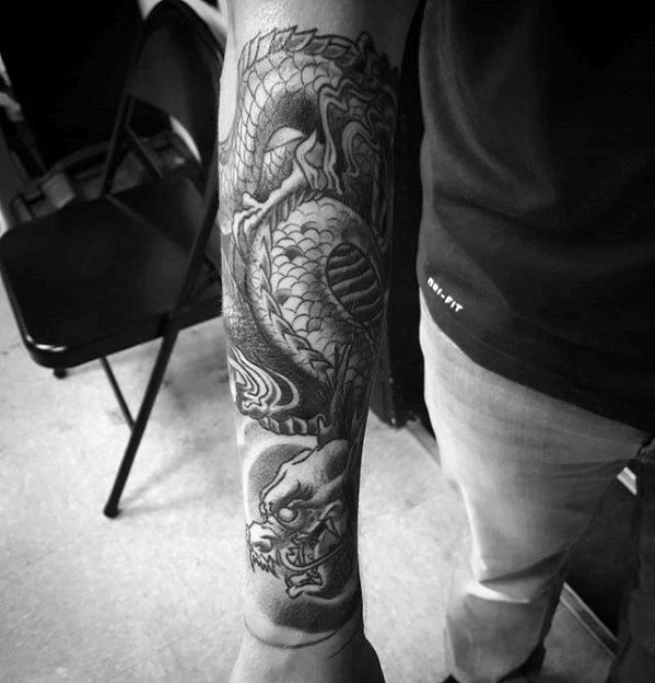 tatuaje dragon antebrazo 24