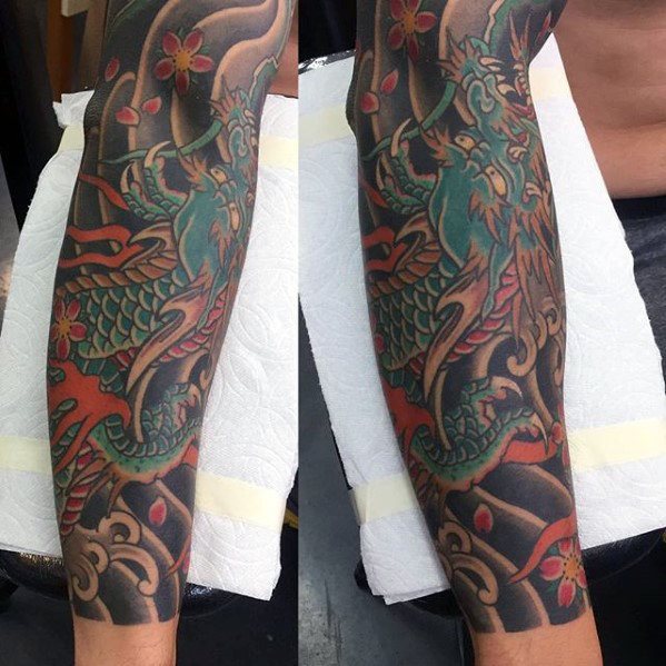 tatuaje dragon antebrazo 44