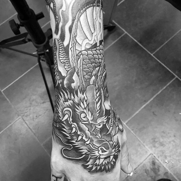 tatuaje dragon antebrazo 56