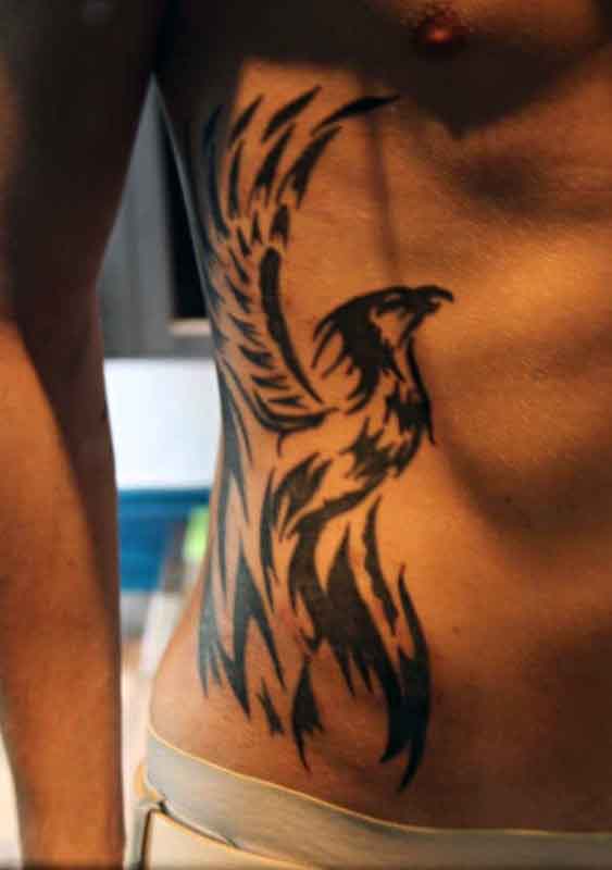 tatuaje fenix tribal para hombre 07