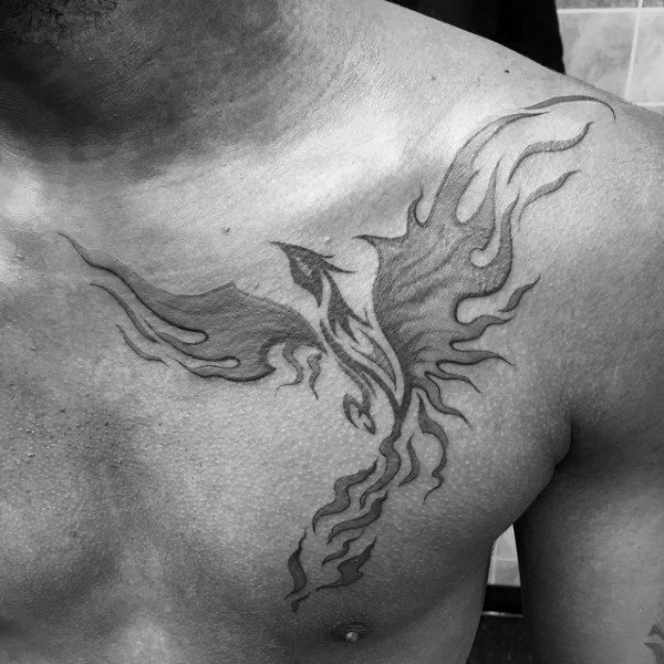 tatuaje fenix tribal para hombre 15