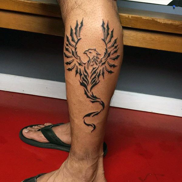 tatuaje fenix tribal para hombre 25