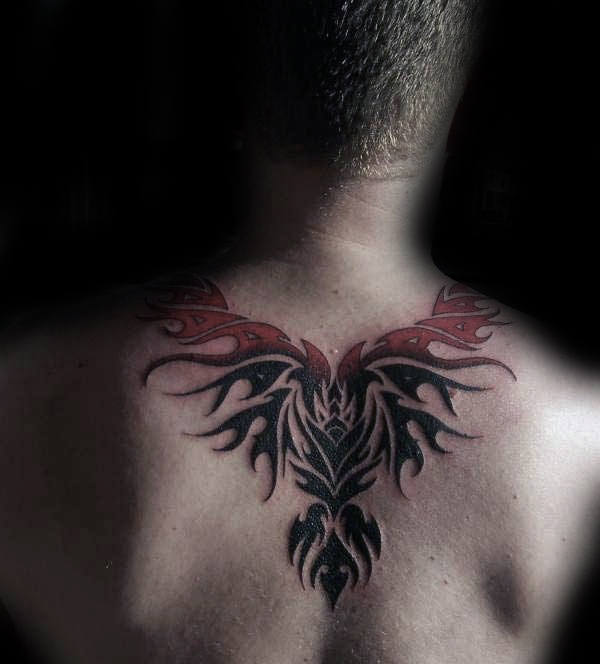 tatuaje fenix tribal para hombre 33