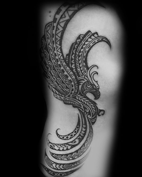 tatuaje fenix tribal para hombre 34