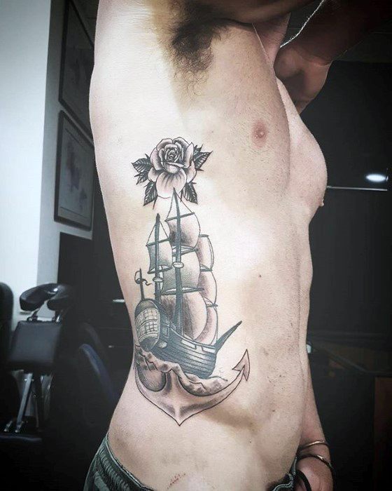 tatuaje increible ancla para hombre 34