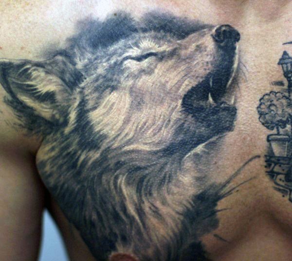 tatuaje lobo pecho para hombre 24