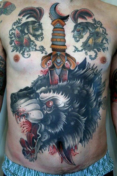 tatuaje lobo pecho para hombre 31