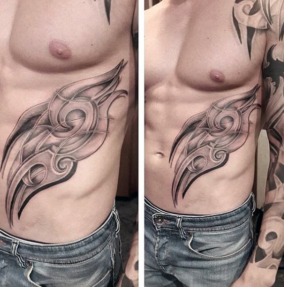 tatuaje tribal costillas para hombre 29