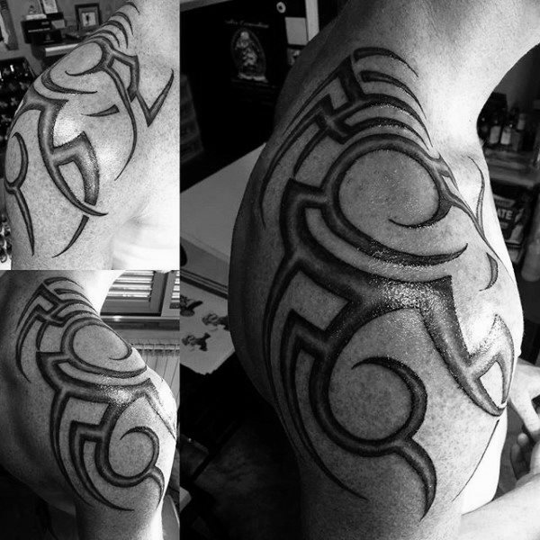 tatuaje tribal hombro para hombre 45