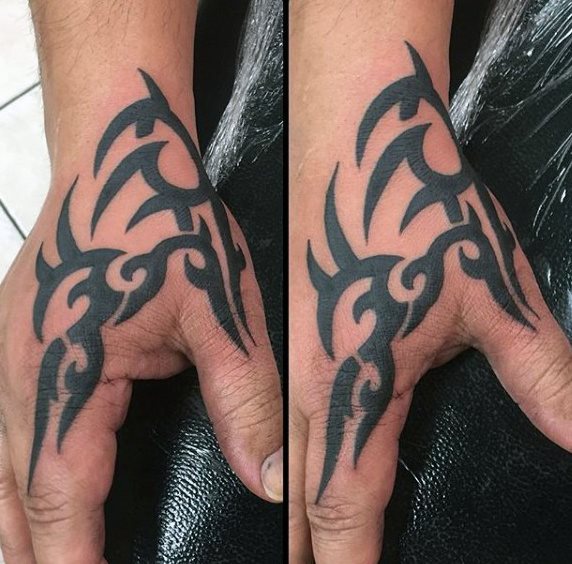tatuaje tribal mano para hombre 30