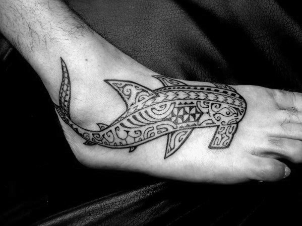 tatuaje tribal pie para hombre 23