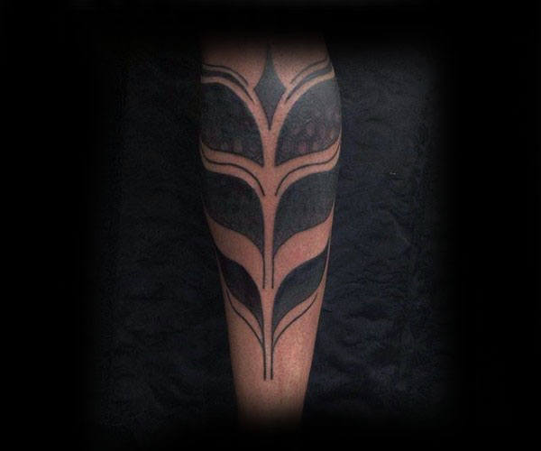 tatuaje tribal pierna para hombre 52
