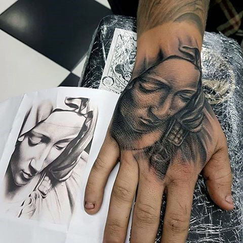 tatuaje virgen maria para hombre 27