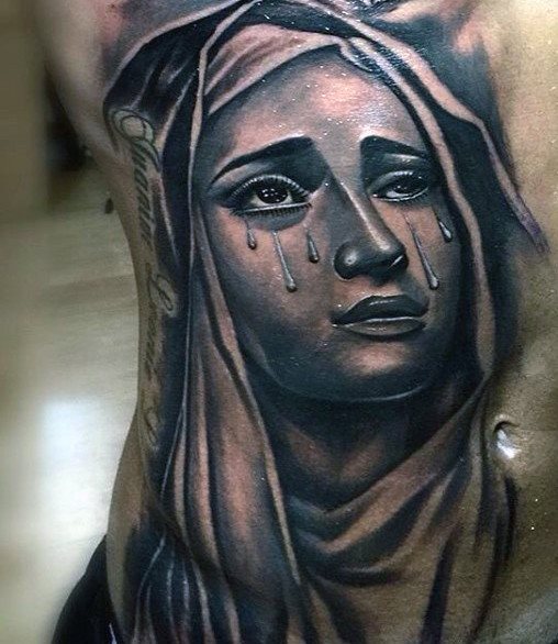 tatuaje virgen maria para hombre 55