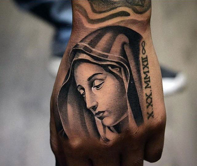 tatuaje virgen maria para hombre 57