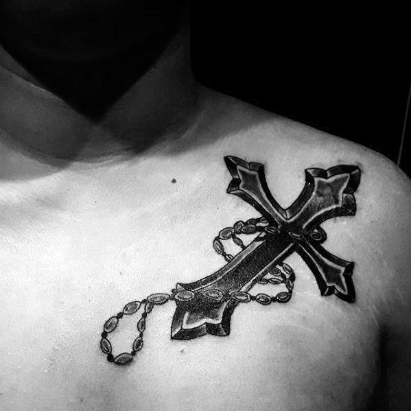 pequeno tatuaje religioso para hombre 07