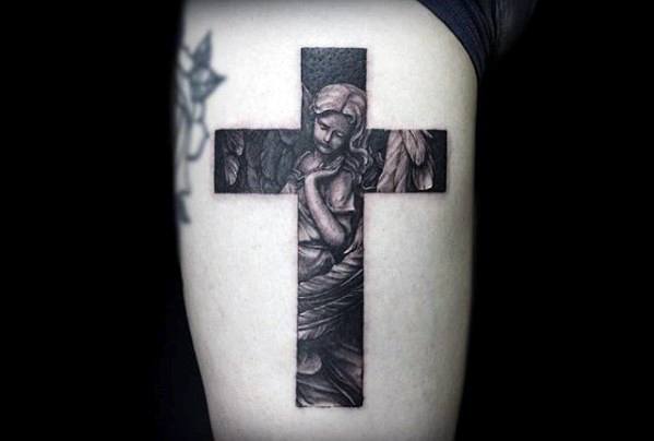 pequeno tatuaje religioso para hombre 29