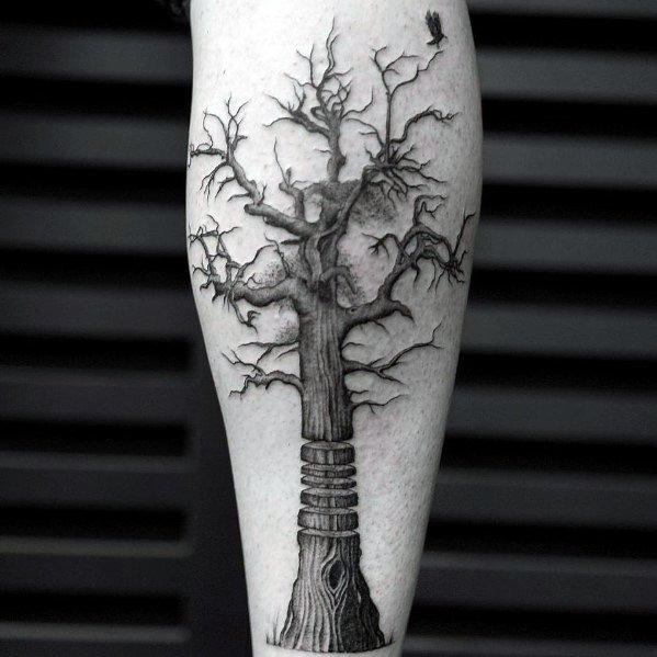 tatuaje arbol pierna para hombre 16