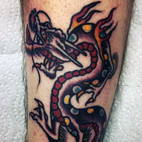 tatuaje dragon simple para hombre 15