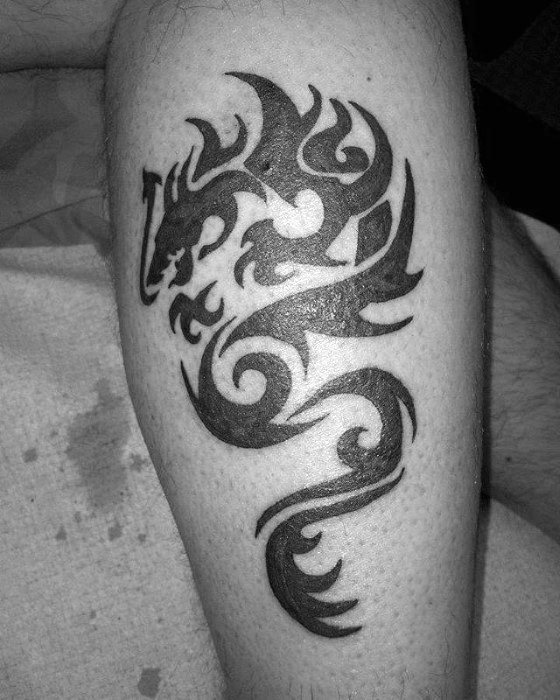 tatuaje dragon simple para hombre 38