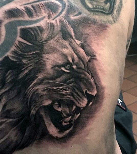tatuaje leon para hombre 53