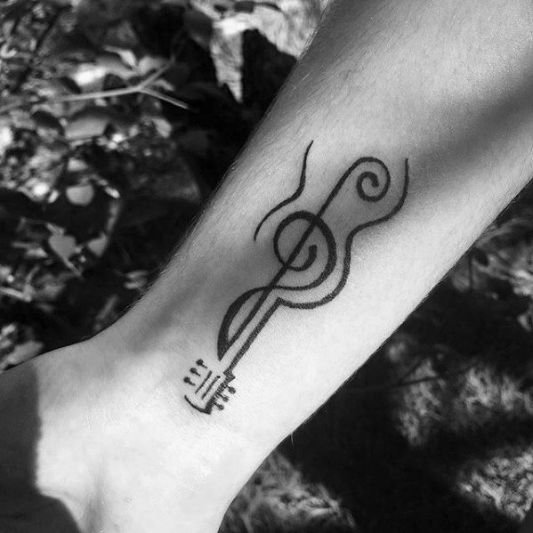 tatuaje musical simple para hombre 14