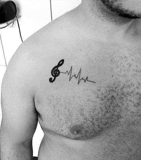 tatuaje musical simple para hombre 17